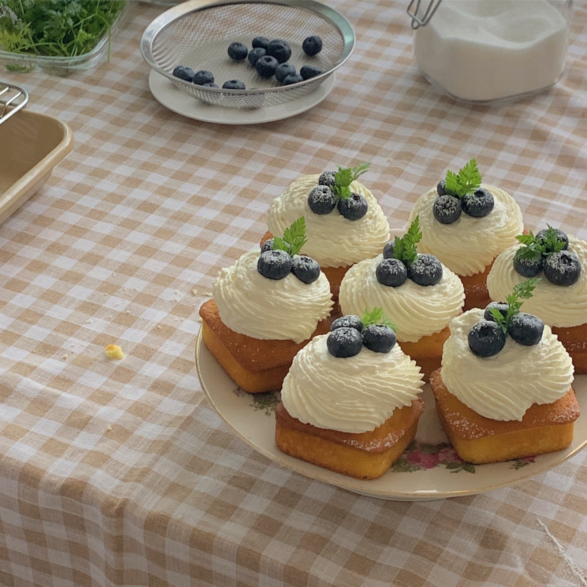 blueberry compote pound cakes on a plate